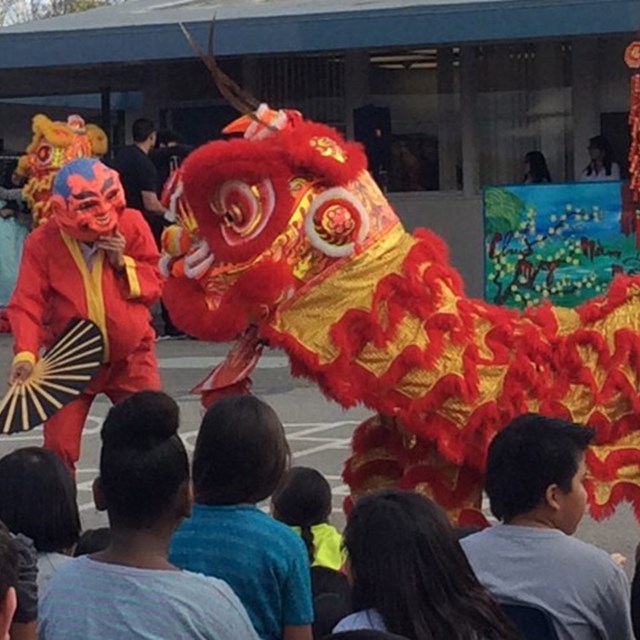 Students are incredibly fascinated by the Lion Dance performance.